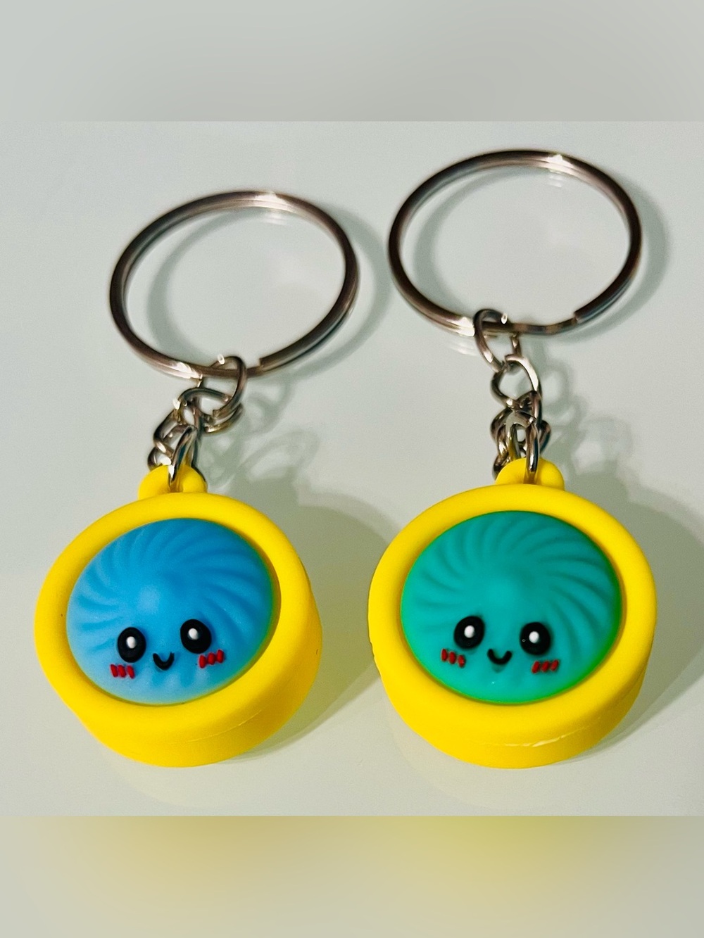 Cute Yellow Silicone Smiley Keychain for Kids - Blue & Teal Faces
